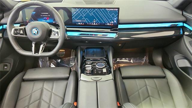 used 2025 BMW i5 car, priced at $52,950