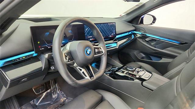 used 2025 BMW i5 car, priced at $52,950
