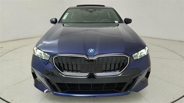 used 2025 BMW i5 car, priced at $52,950