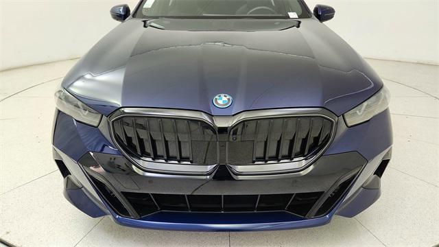 used 2025 BMW i5 car, priced at $52,950