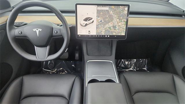 used 2025 Tesla Model Y car, priced at $37,450