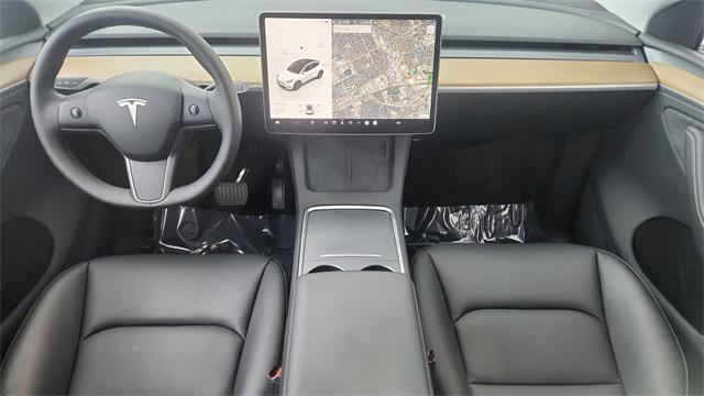 used 2025 Tesla Model Y car, priced at $37,450