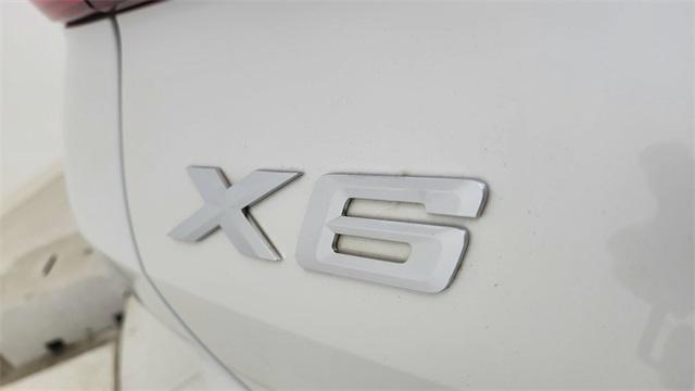 used 2023 BMW X6 car, priced at $62,750