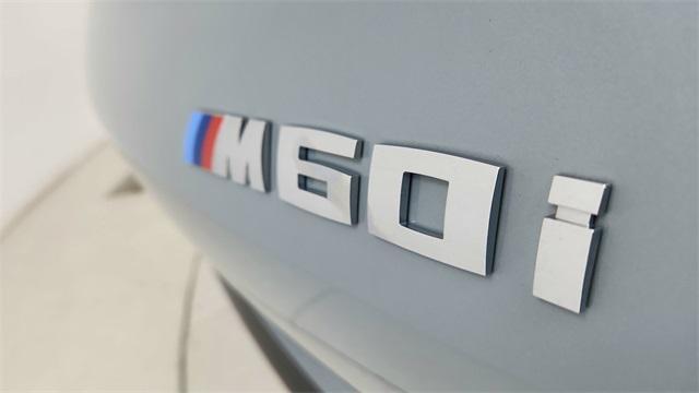 used 2025 BMW X6 car, priced at $88,950