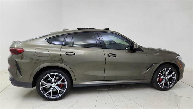 used 2023 BMW X6 car, priced at $58,450