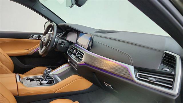 used 2023 BMW X6 car, priced at $58,450