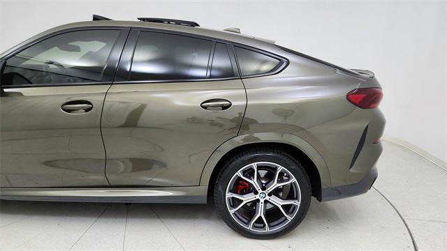 used 2023 BMW X6 car, priced at $58,450