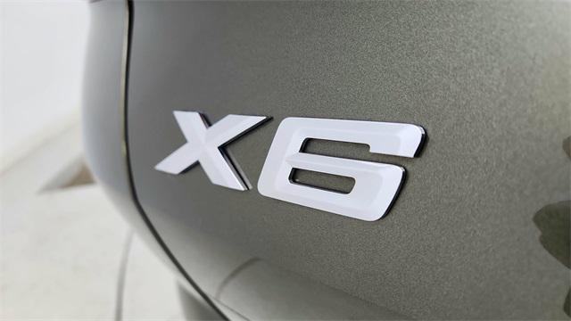 used 2023 BMW X6 car, priced at $58,450