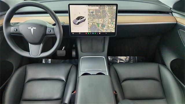 used 2025 Tesla Model Y car, priced at $36,950