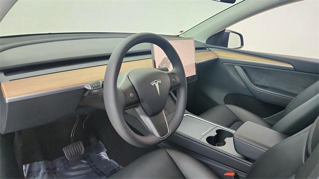 used 2025 Tesla Model Y car, priced at $38,450