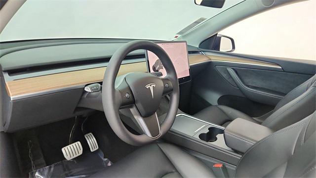 used 2024 Tesla Model Y car, priced at $38,450