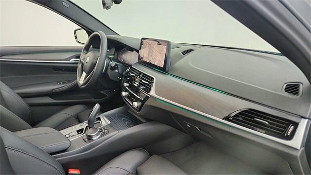 used 2023 BMW 530e car, priced at $32,450