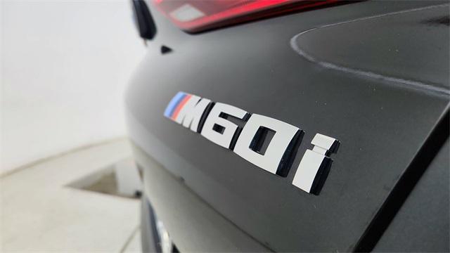 used 2024 BMW X6 car, priced at $78,750