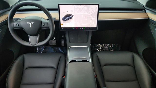 used 2025 Tesla Model Y car, priced at $38,950