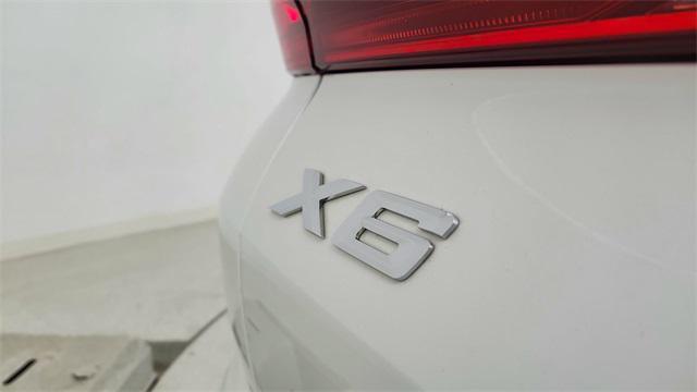 used 2024 BMW X6 car, priced at $67,850