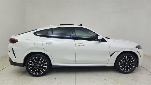used 2024 BMW X6 car, priced at $67,850
