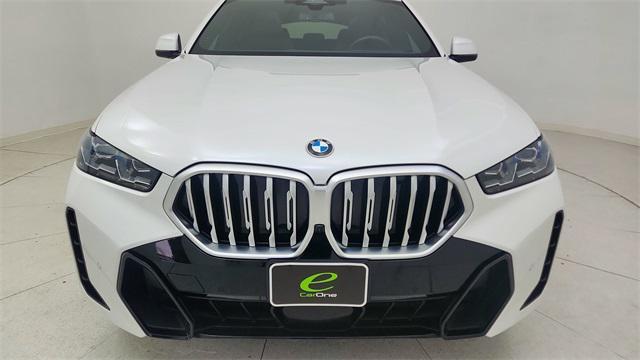 used 2024 BMW X6 car, priced at $67,850