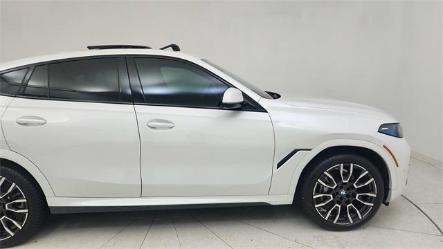 used 2024 BMW X6 car, priced at $67,850