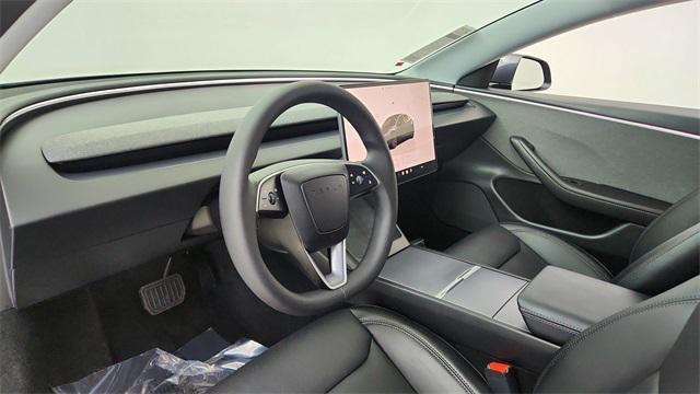 used 2025 Tesla Model 3 car, priced at $36,950