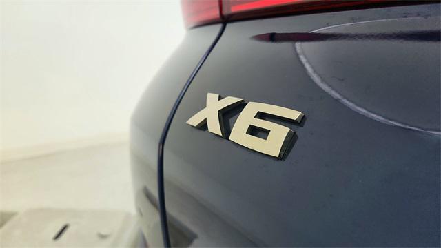 used 2023 BMW X6 car, priced at $64,750