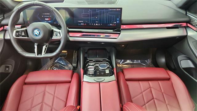 used 2025 BMW i5 car, priced at $50,950