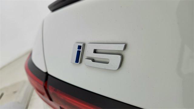 used 2025 BMW i5 car, priced at $50,950