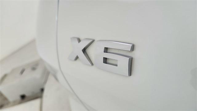 used 2025 BMW X6 car, priced at $88,450