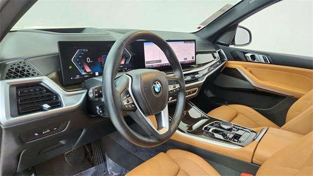 used 2026 BMW X5 car, priced at $58,950