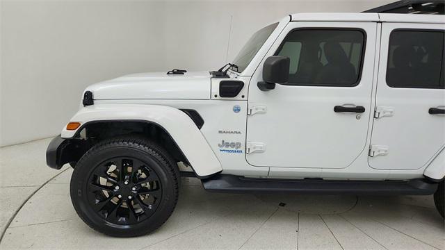 used 2021 Jeep Wrangler Unlimited car, priced at $27,877