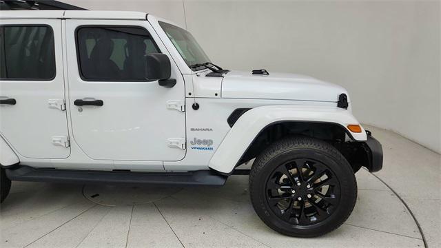 used 2021 Jeep Wrangler Unlimited car, priced at $27,877