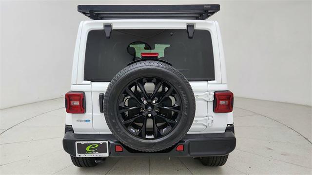 used 2021 Jeep Wrangler Unlimited car, priced at $27,877