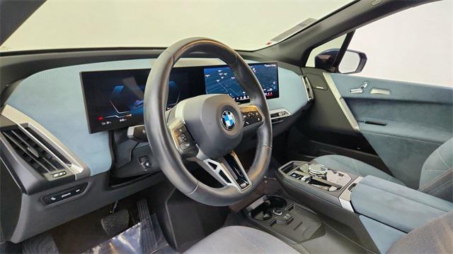 used 2025 BMW iX car, priced at $55,850