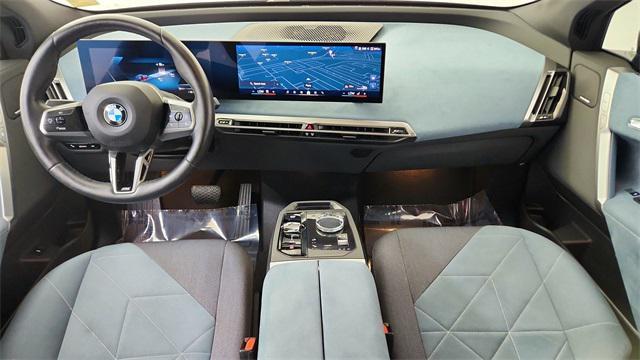 used 2025 BMW iX car, priced at $55,850