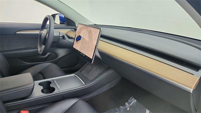 used 2023 Tesla Model 3 car, priced at $30,950
