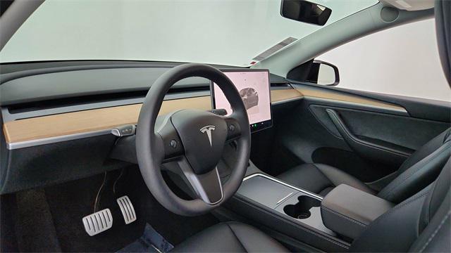 used 2024 Tesla Model Y car, priced at $39,450