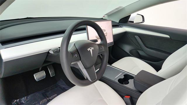 used 2023 Tesla Model 3 car, priced at $27,750