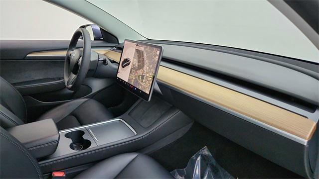 used 2023 Tesla Model 3 car, priced at $27,850