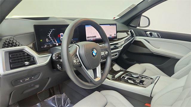 used 2025 BMW X5 car, priced at $62,950