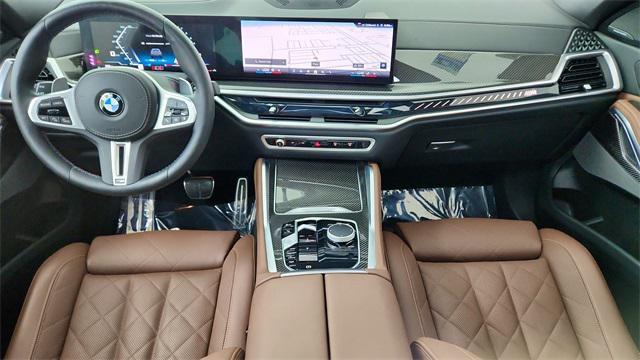used 2025 BMW X6 car, priced at $87,950