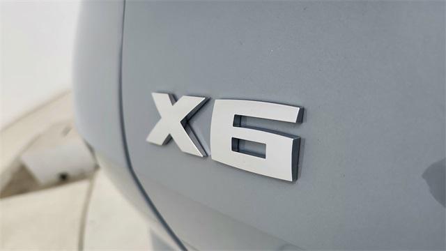 used 2025 BMW X6 car, priced at $87,950