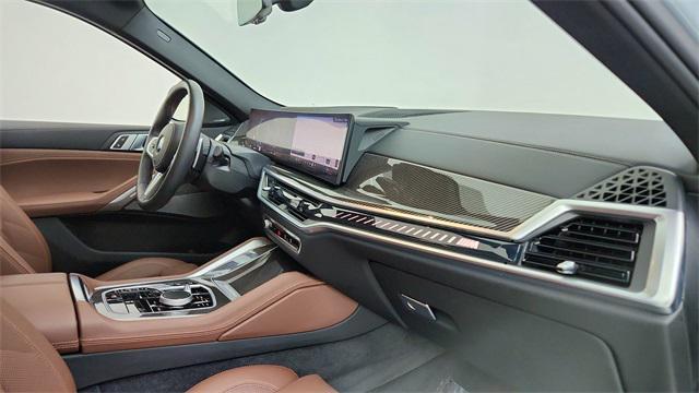 used 2025 BMW X6 car, priced at $87,950