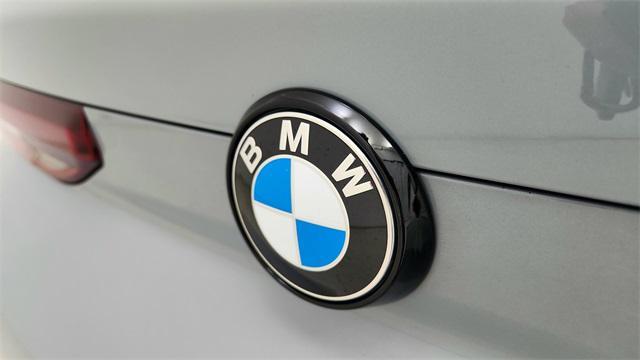 used 2025 BMW X6 car, priced at $87,950