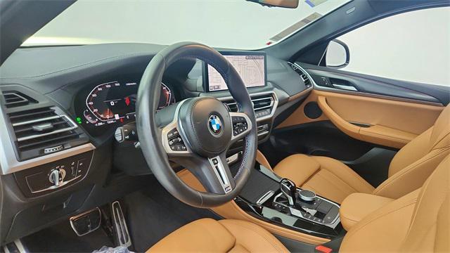 used 2025 BMW X4 car, priced at $54,750