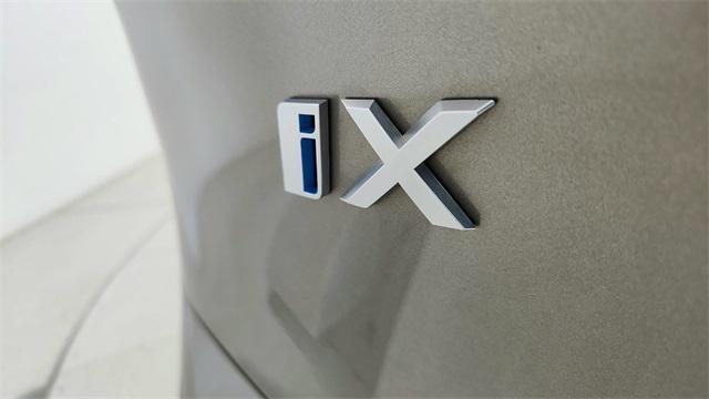 used 2024 BMW iX car, priced at $58,850