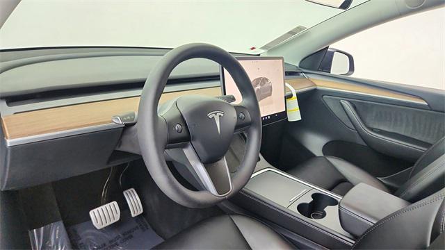 used 2024 Tesla Model Y car, priced at $39,850