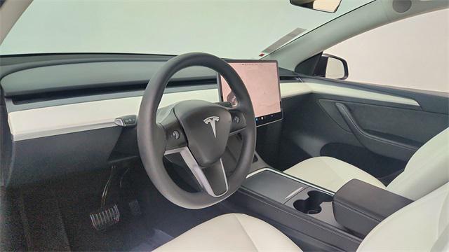 used 2024 Tesla Model Y car, priced at $34,450