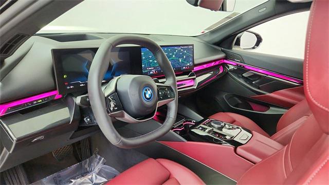 used 2024 BMW i5 car, priced at $44,950