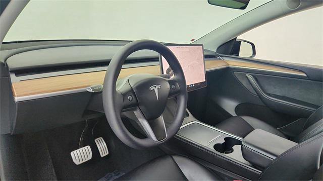 used 2024 Tesla Model Y car, priced at $38,450