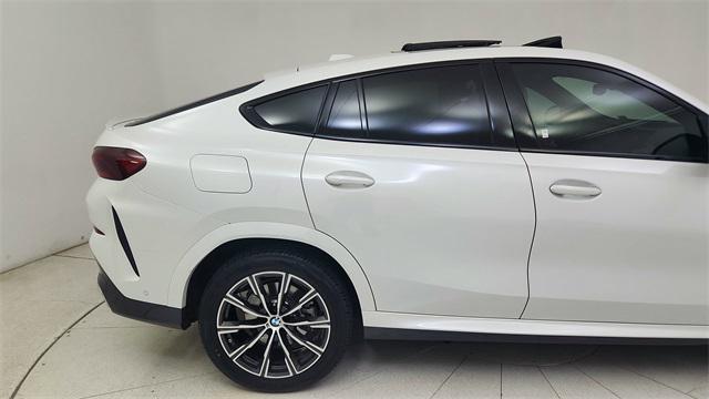 used 2025 BMW X6 car, priced at $68,950