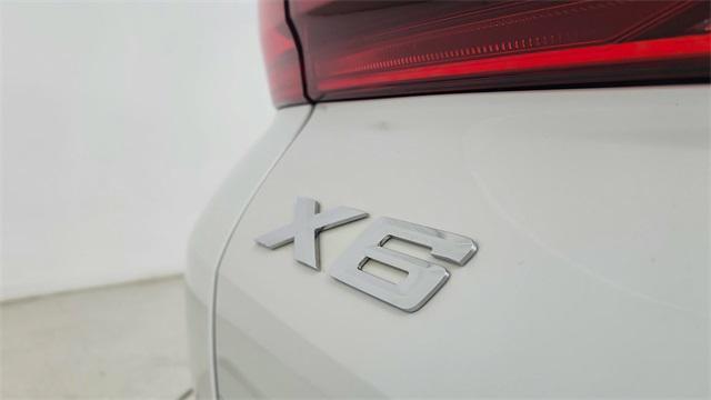 used 2025 BMW X6 car, priced at $68,950